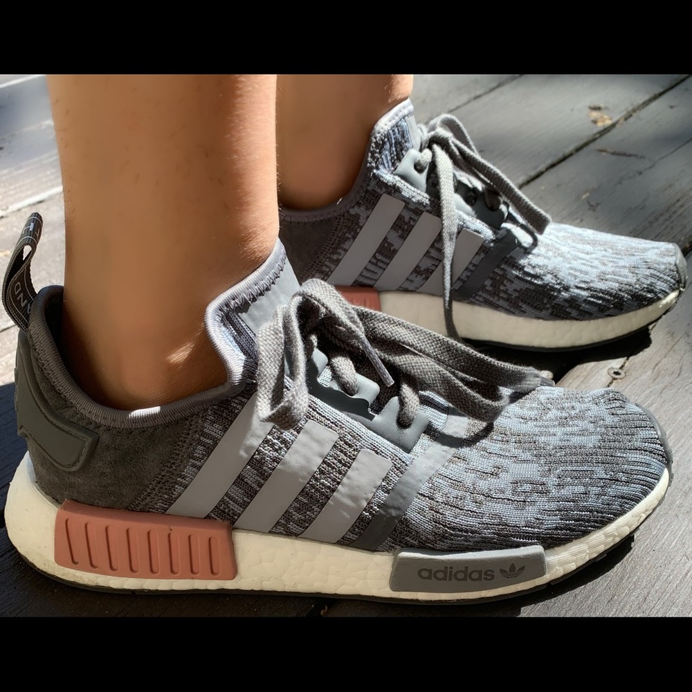 Grey and pink woman’s NMDs R1